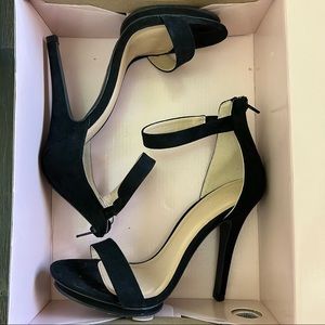 Black high heels with zipper